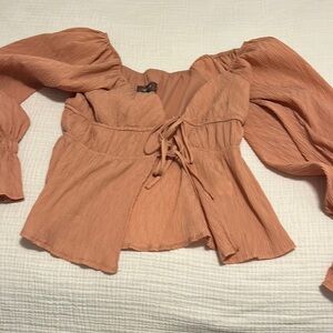 Peach plisse tie front top